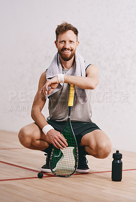 Buy stock photo Portrait of a young man taking a break after playing a game of squash