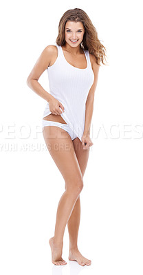 Buy stock photo Studio portrait of a gorgeous young woman smiling while posing in a tank top against a white background