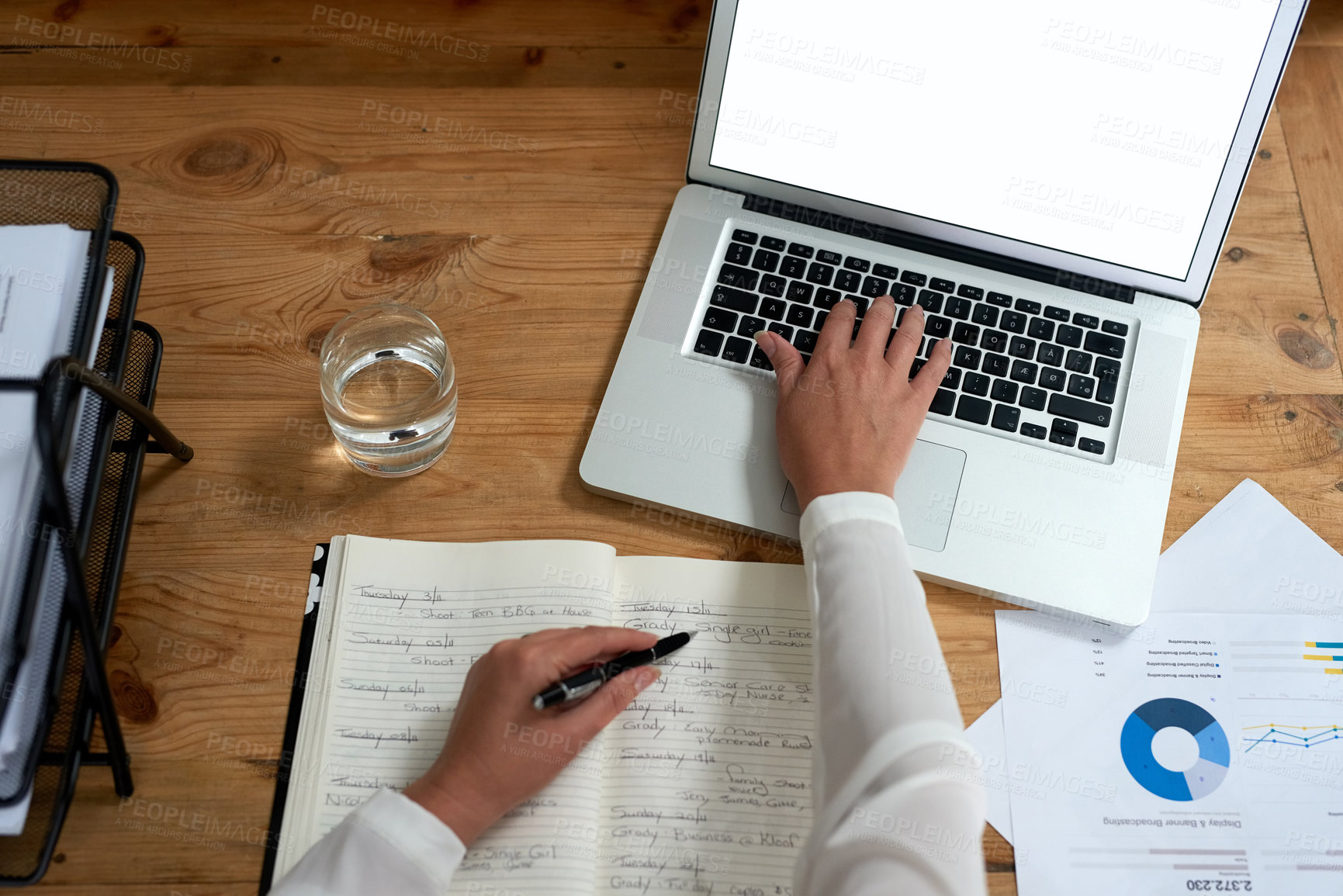 Buy stock photo High angle shot of businesswoman working on her laptop at her desk