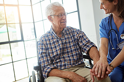 Buy stock photo Cropped shot of a female nurse talking to a senior patient in the retirement home