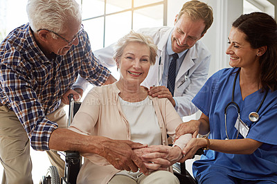 Buy stock photo Cropped shot of a senior couple in the retirement with their doctor and nurse