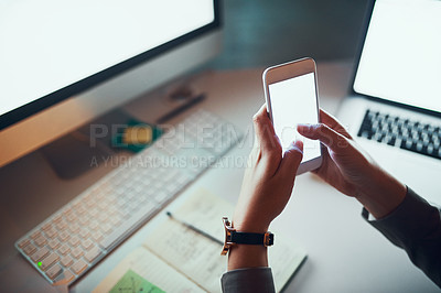 Buy stock photo Cropped shot of an unrecognizable woman using a cellphone in the office