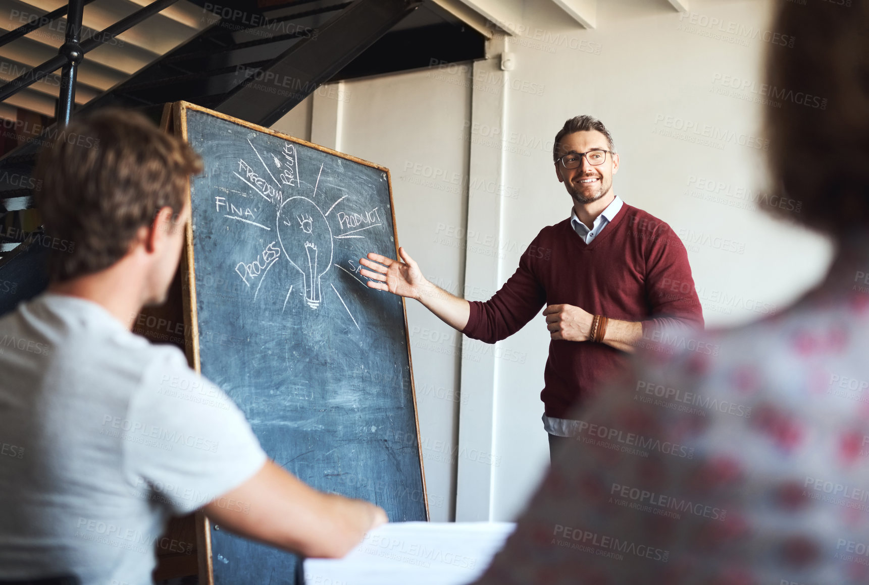 Buy stock photo Shot of a creative business team having a meeting and discussing business related issues in the office