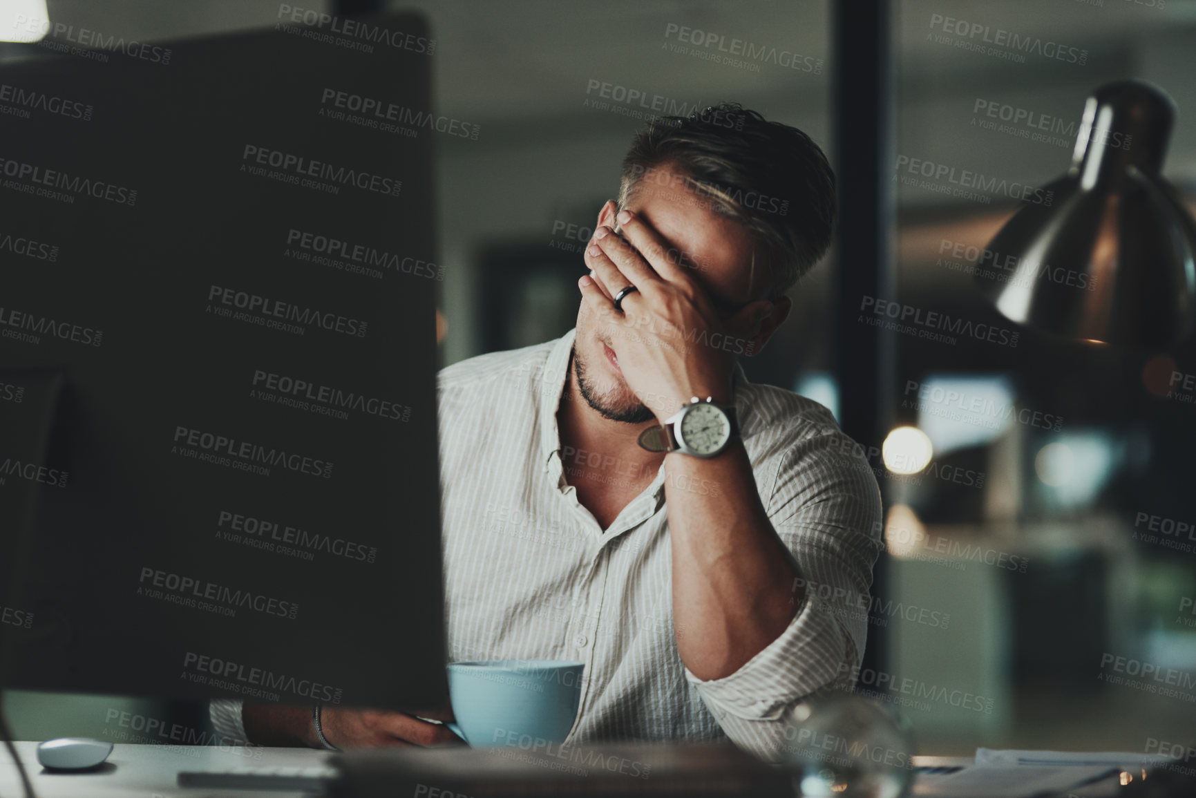 Buy stock photo Night, man and tired at desk with headache, stress or anxiety for economy crash. Male accountant, budget issue or migraine in office with technology, depression or financial crisis or missed deadline