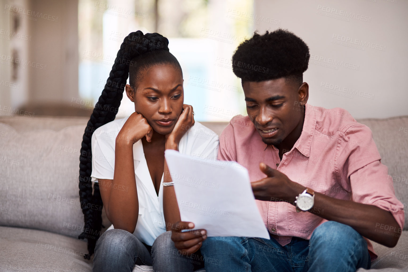 Buy stock photo Home, black couple and debt with discussion for document, financial bills and bank mortgage loan. Frustrated people, woman and man with stress for budget cost, balance crisis and expenses on sofa