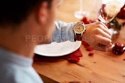 Buy stock photo Man checking watch, time on date at dinner table and waiting for person at a restaurant reservation. Impatient guy alone at coffee shop, stress of modern dating and closeup of looking at wristwatch