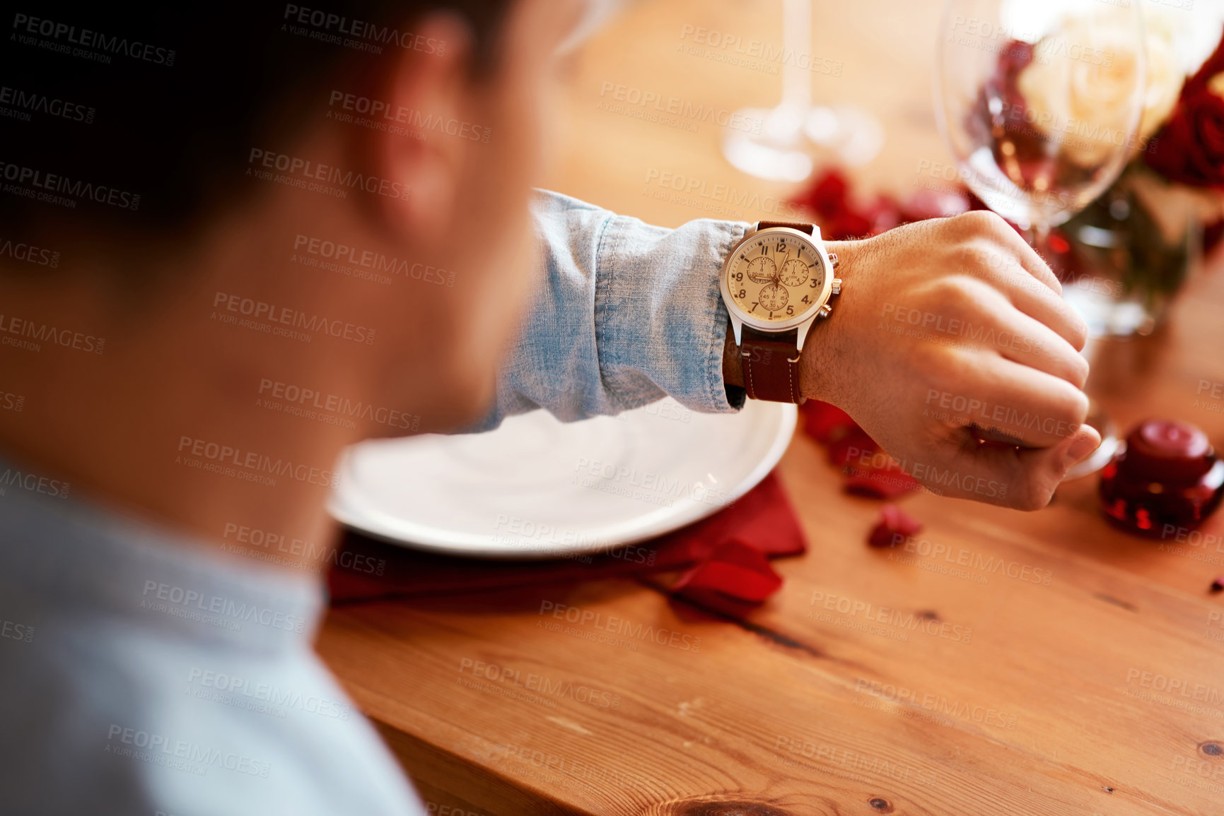Buy stock photo Man checking watch, time on date at dinner table and waiting for person at a restaurant reservation. Impatient guy alone at coffee shop, stress of modern dating and closeup of looking at wristwatch