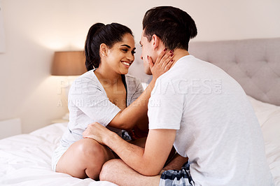 Buy stock photo Love bond, bedroom or happy couple relax for romantic connection, peace and morning quality time together. Eye contact, Toronto Canada vacation or people smile in hotel bed for Valentines Day holiday