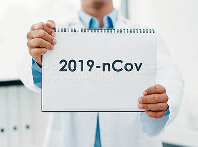 Buy stock photo Man, doctor and hands with poster for covid, pandemic or start of year or virus at hospital. Closeup, medical professional or healthcare employee with sign, page or paper for post or pre coronavirus