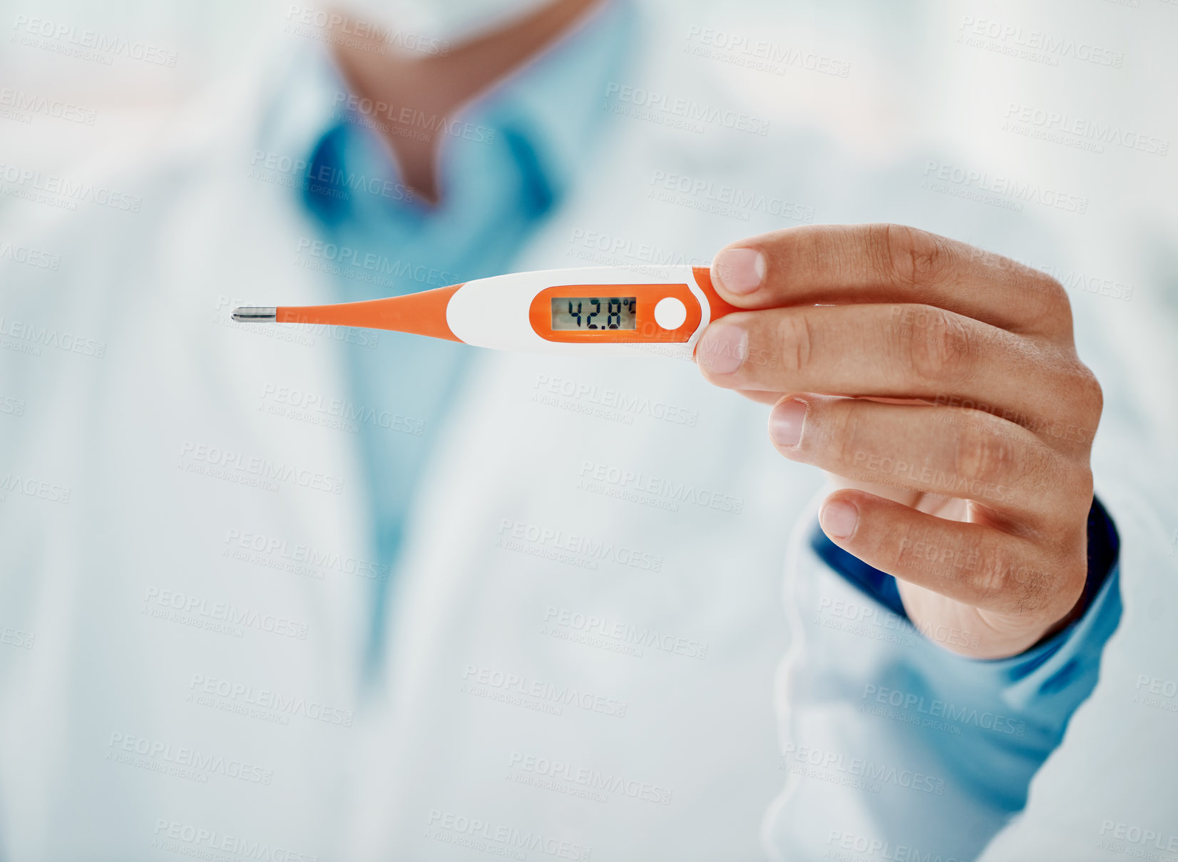 Buy stock photo Cropped shot of a doctor holding a thermometer that reads 42.8 degrees centigrade
