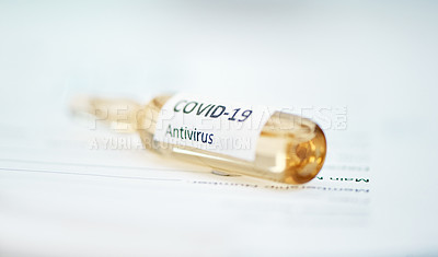 Buy stock photo Shot of an ampoule with 2019-nCov on it