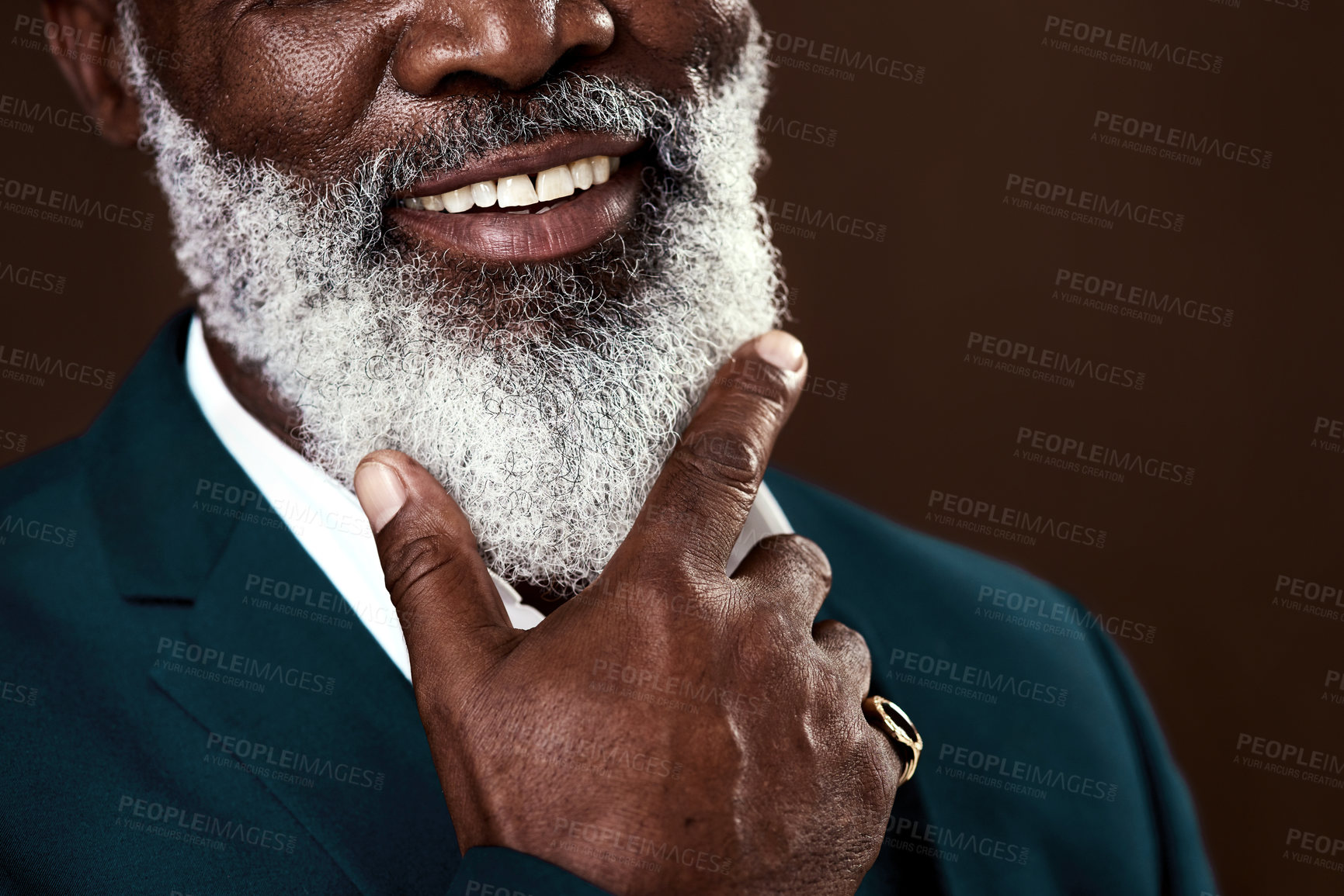 Buy stock photo Cropped shot of a man with grey beard posing against a brown background