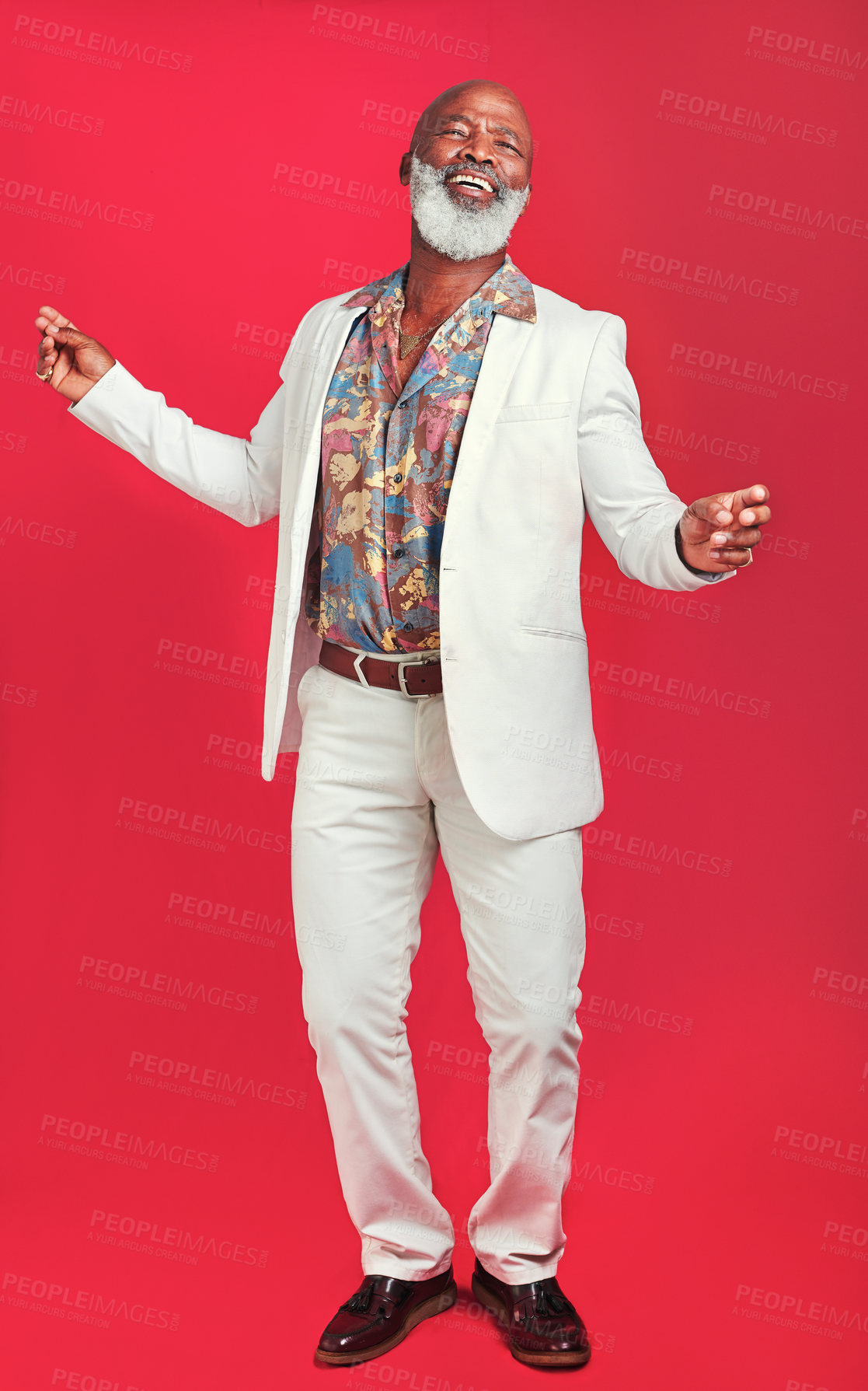 Buy stock photo Studio shot of a man wearing vintage clothes while dancing against a red background