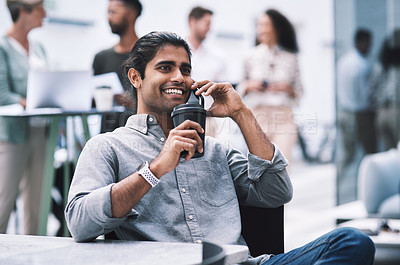 Buy stock photo Shot of a young businessman using a smartphone at a conference