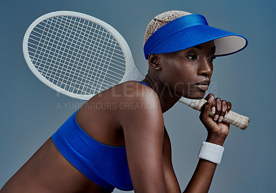 Buy stock photo Black woman, thinking and tennis fitness in studio, sports planning and racket on blue background. Female person, athlete and equipment for exercise activity, reflection and workout for competition