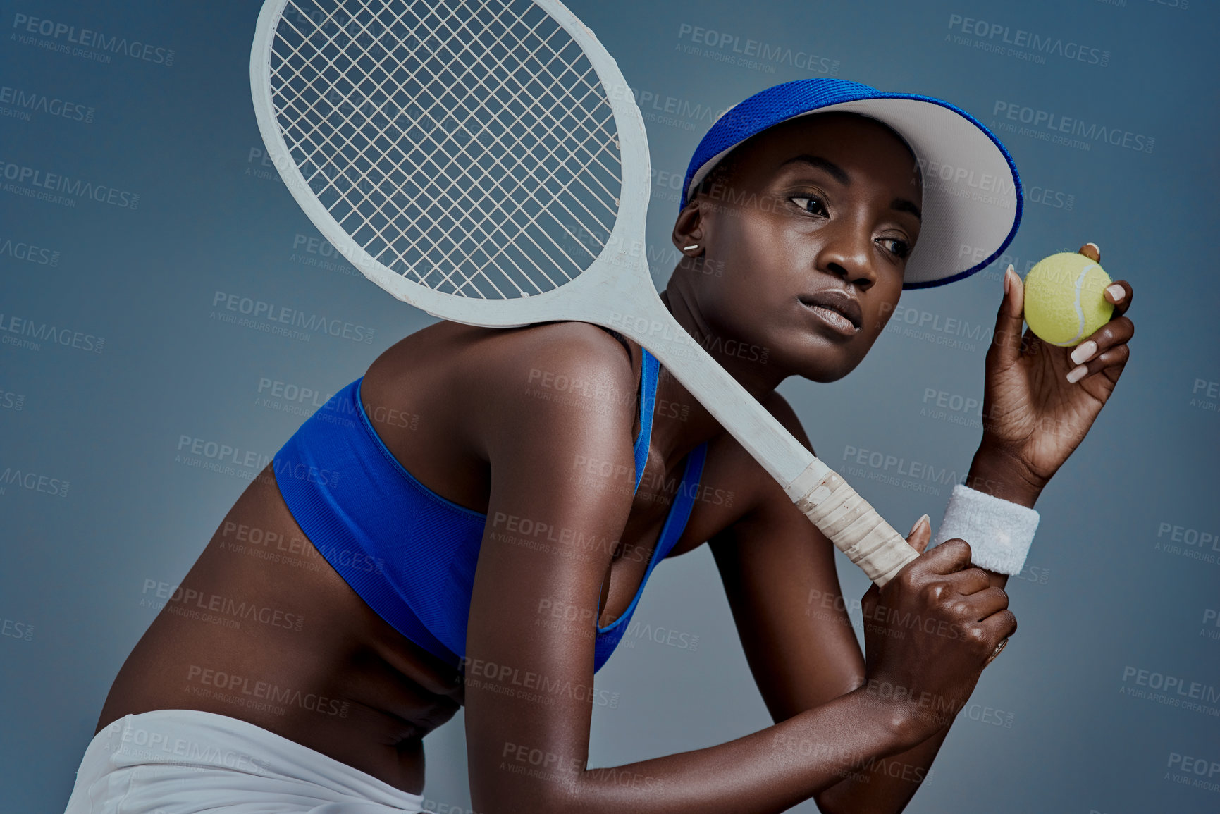 Buy stock photo Black woman, thinking and tennis ball in studio, athlete planning and racket on blue background. Female person, player and equipment for exercise activity, reflection and workout for competition