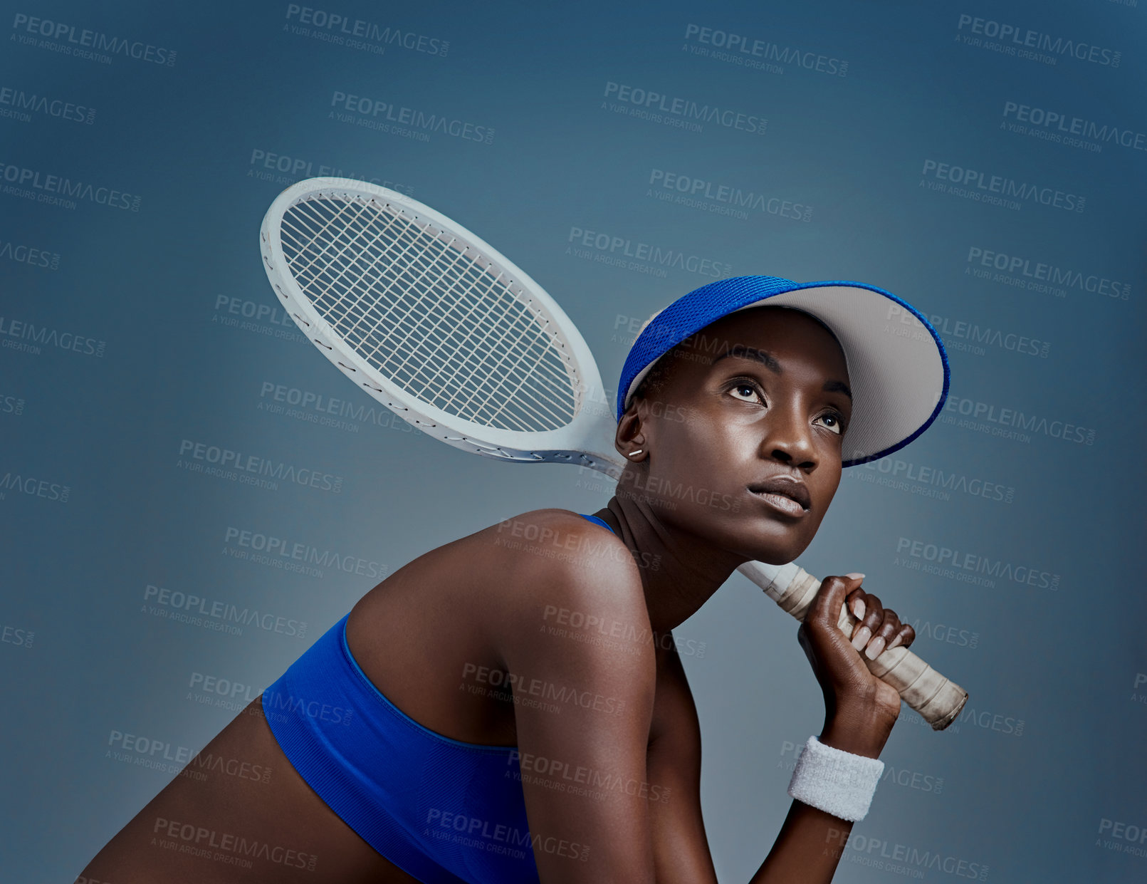 Buy stock photo Black woman, thinking and tennis exercise in studio, sports planning and racket on blue background. Female person, athlete and equipment for fitness activity, reflection and workout for competition