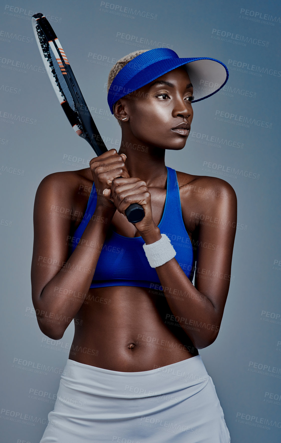 Buy stock photo Black woman, thinking and play tennis in studio, sports planning and racket on blue background. Female person, athlete and equipment for exercise activity, reflection and workout for competition