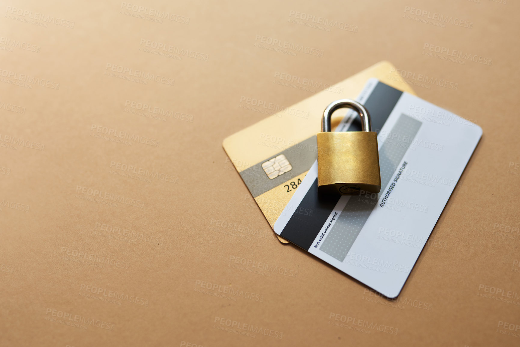 Buy stock photo Finance safety, debit card and lock for security with data protection, risk management and phishing. Banking privacy, padlock or secure access to fraud, hacking and theft on studio background mockup