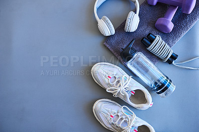 Buy stock photo Fitness, mockup and sneakers with equipment for workout with water bottle in gym for health. Sneakers, headphones and top view of dumbbell weights and skipping rope for training in sports center.