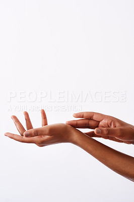 Buy stock photo Studio shot of an unrecognizable woman's hands against a white background