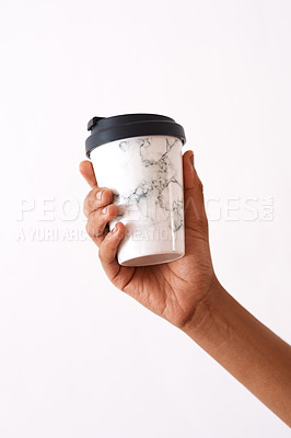 Buy stock photo Coffee, travel mug and hand on a white background for drink, caffeine beverage and cappuccino. Mockup, studio and isolated person with thermos cup for cafe takeaway, reusable and sustainability