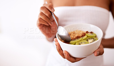 Buy stock photo Woman, hands and bowl with fruit for diet, healthy meal or snack in studio on a white background. Closeup, female person or model with kiwi, oats or natural organic food for breakfast or nutrition