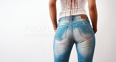 Buy stock photo Studio shot of an unrecognizable woman posing in a pair of jeans