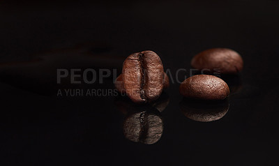 Buy stock photo Flavor, space and organic coffee beans in studio with caffeine, reflection and sustainable business for cafe. Espresso, grain and fresh roast with taste, mockup and drink culture on black background