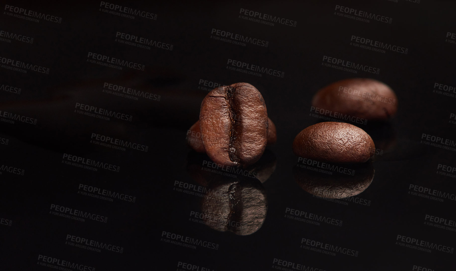 Buy stock photo Studio shot of coffee beans against a black background