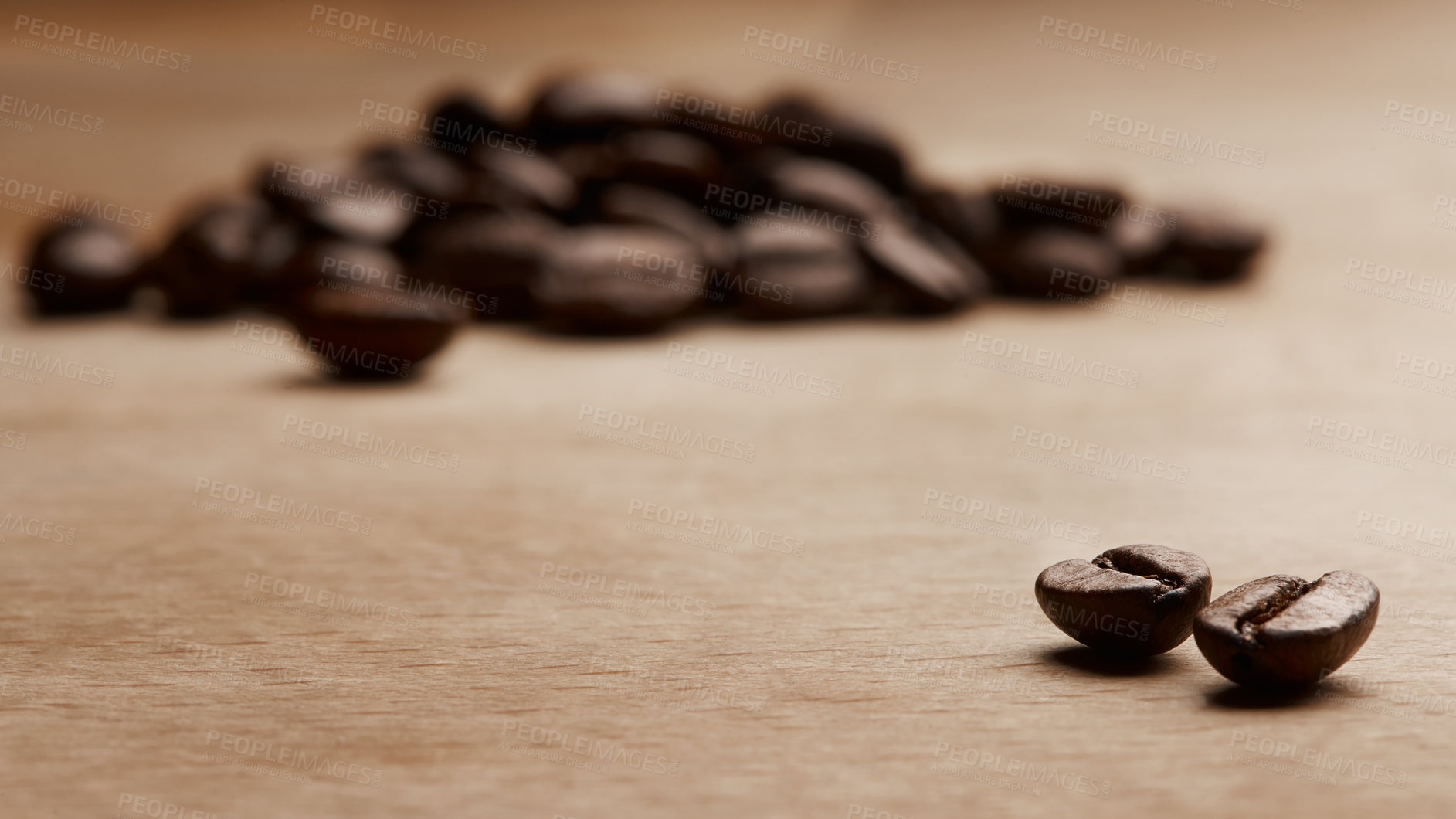 Buy stock photo Coffee beans, grain and closeup on table at factory, plant and quality assurance for export. Product, texture and caffeine manufacturing with organic stock, ingredients or sustainability at warehouse