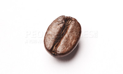 Buy stock photo Studio shot of a coffee bean against a white background