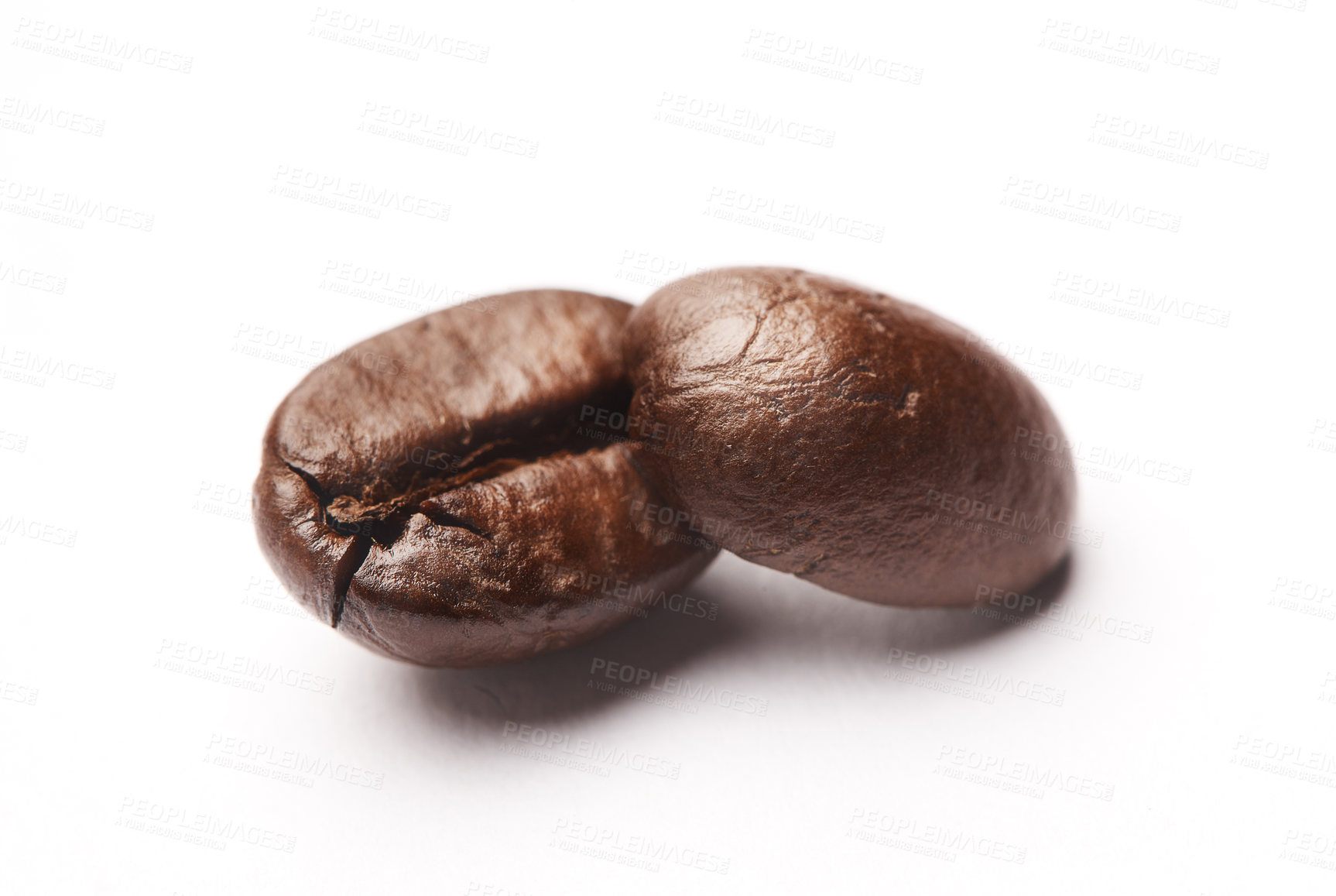 Buy stock photo Studio shot of coffee beans against a white background