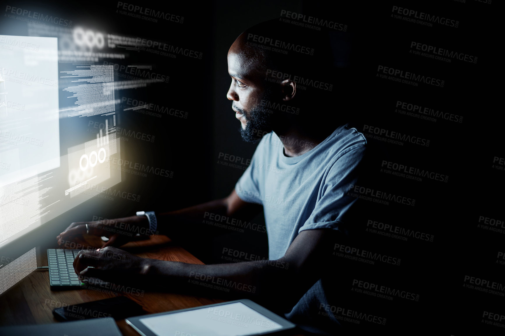 Buy stock photo Shot of a programmer working on a computer code at night