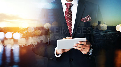 Buy stock photo Cropped shot of an unidentifiable businessman using a tablet superimposed over a cityscape