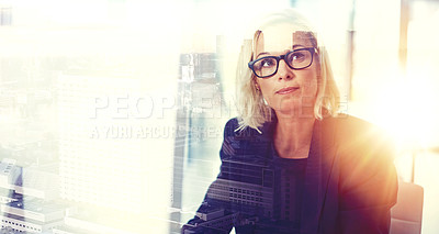 Buy stock photo Shot of a businesswoman at her desk superimposed over a cityscape