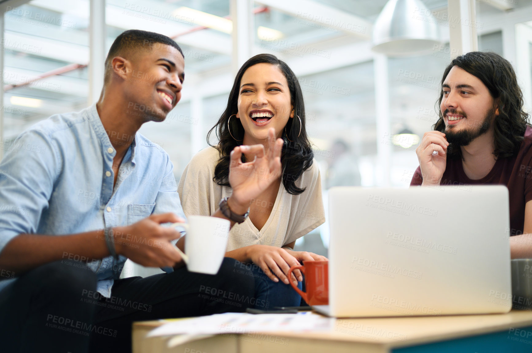 Buy stock photo Shot of a group of businesspeople having a discussion in an office