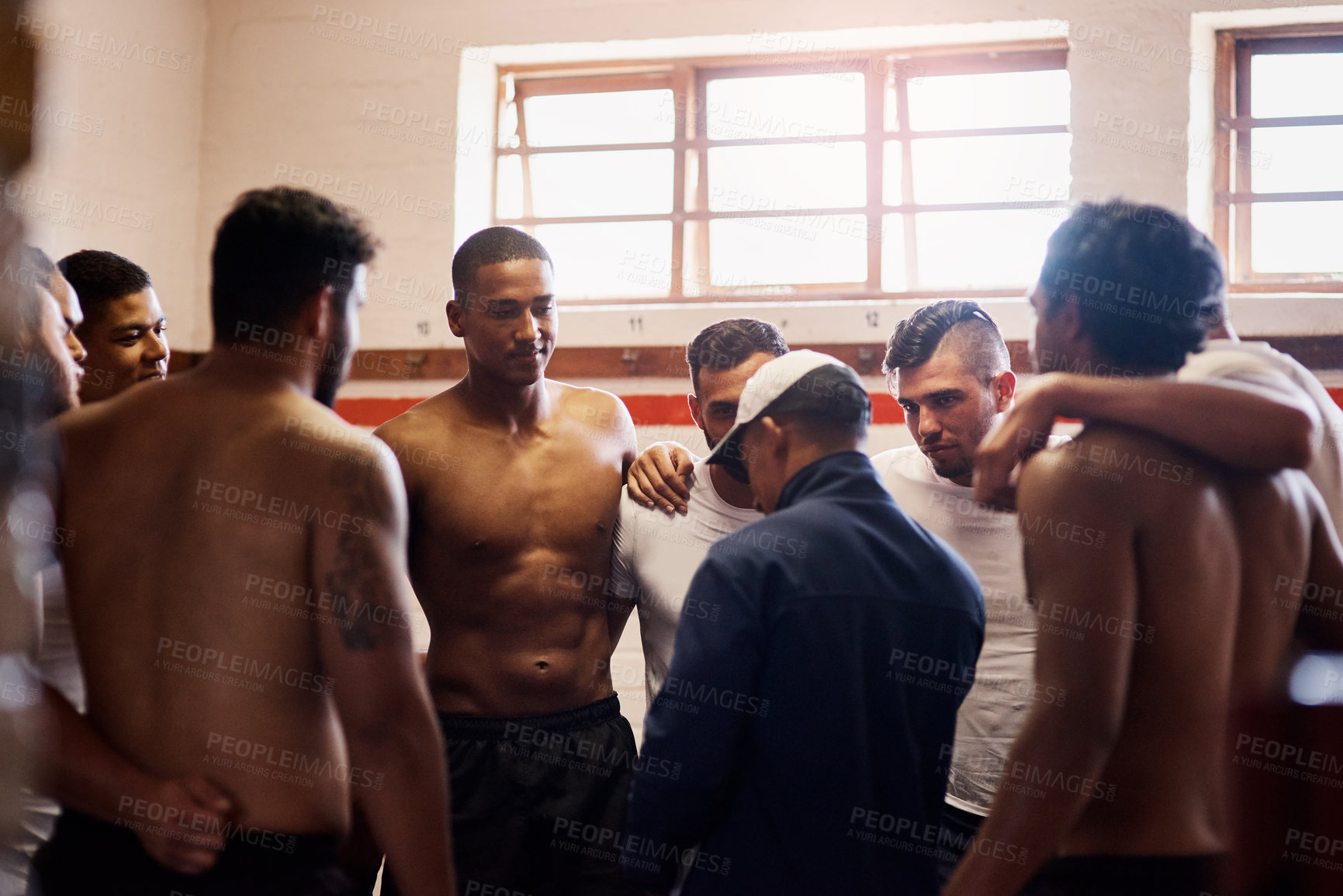 Buy stock photo Men, rugby and coaching for team building, exercise or game strategy in locker room for fitness. Male people, huddle and trainer with leadership, mentor and preparation for sports match or challenge