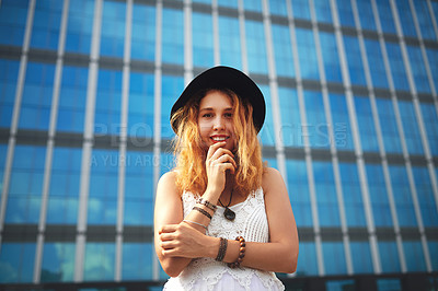 Buy stock photo Portrait, woman and smile in city for travel, adventure or sightseeing as musician for band on tour. Female person, happiness and outdoor with glass building, architecture and urban background in USA