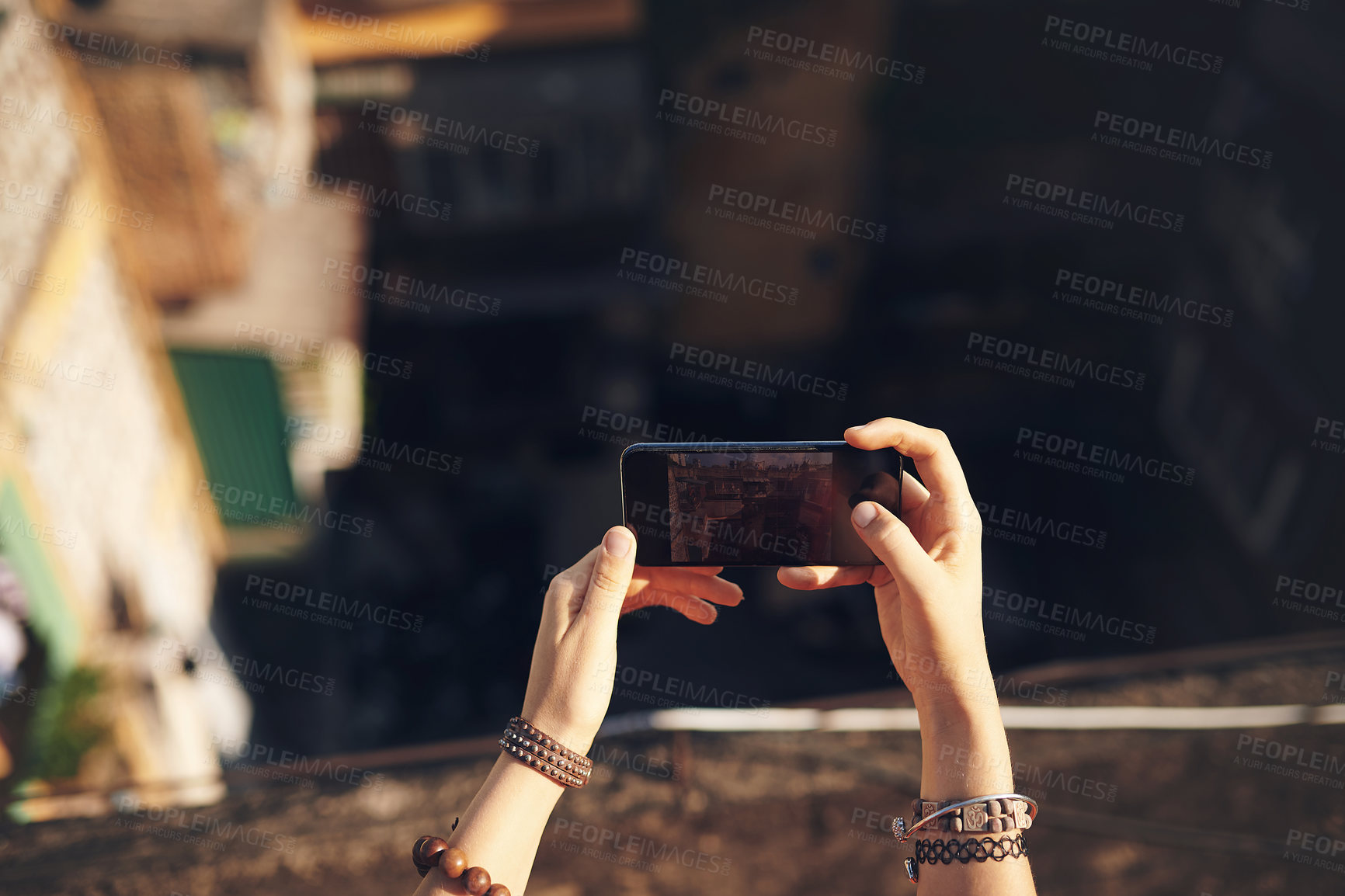 Buy stock photo Travel, phone screen and hands of woman with memory, buildings and outdoor city adventure on holiday. Digital photography, tourism and influencer girl on urban vacation with social media live stream