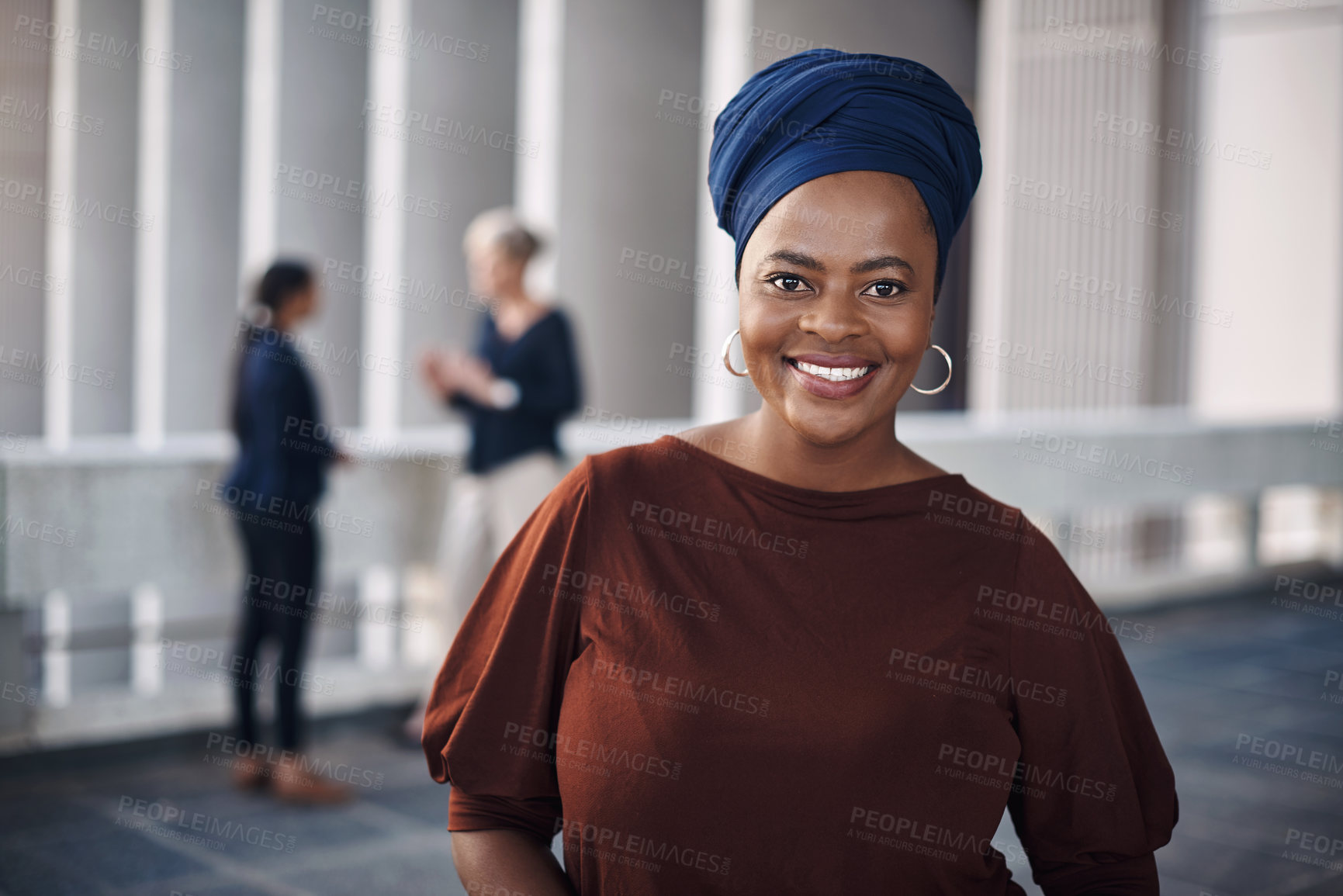 Buy stock photo Portrait of a confident young businesswoman against a city background