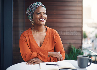 Buy stock photo Cropped shot of an attractive businesswoman working at a desk in her office