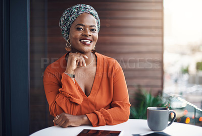 Buy stock photo Cropped portrait of an attractive businesswoman working at a desk in her office