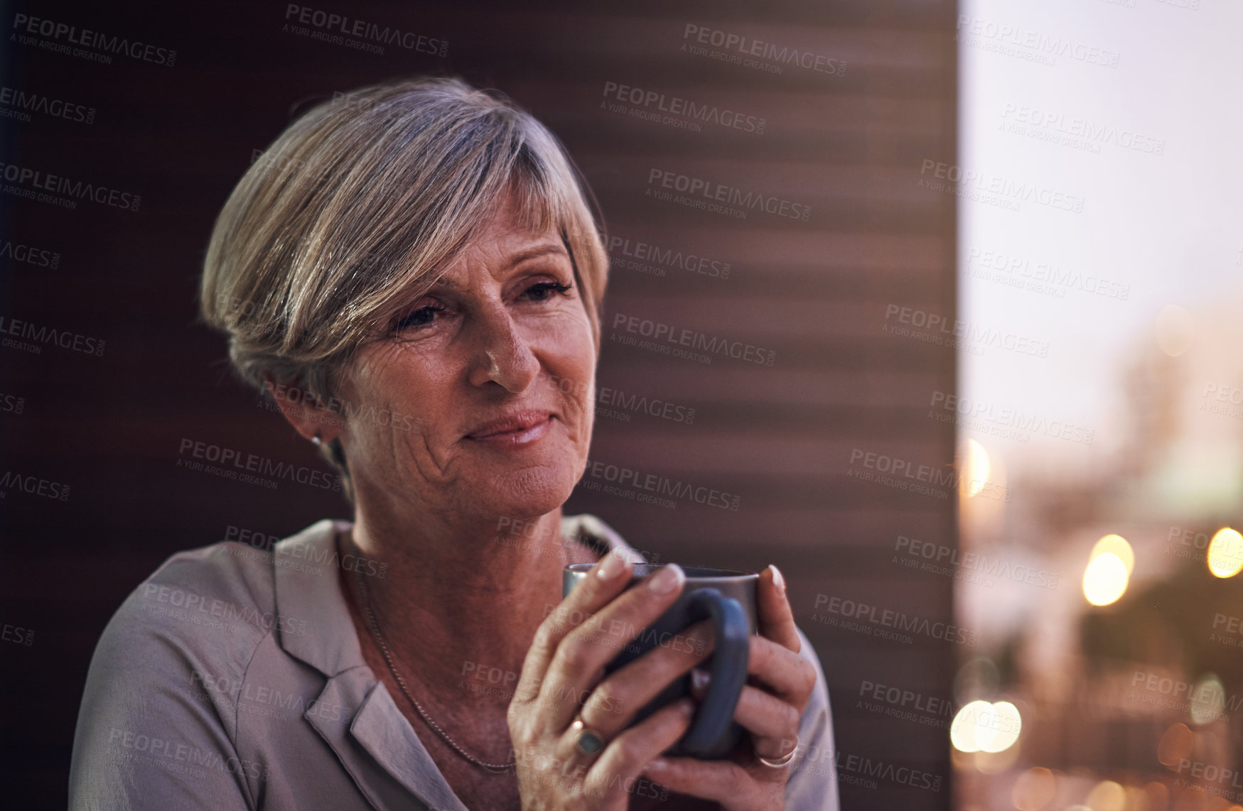 Buy stock photo Coffee, ideas and woman by office balcony at night with caffeine for overtime project. Smile, thinking and mature female ceo drink cappuccino with brainstorming for company growth on rooftop in city.