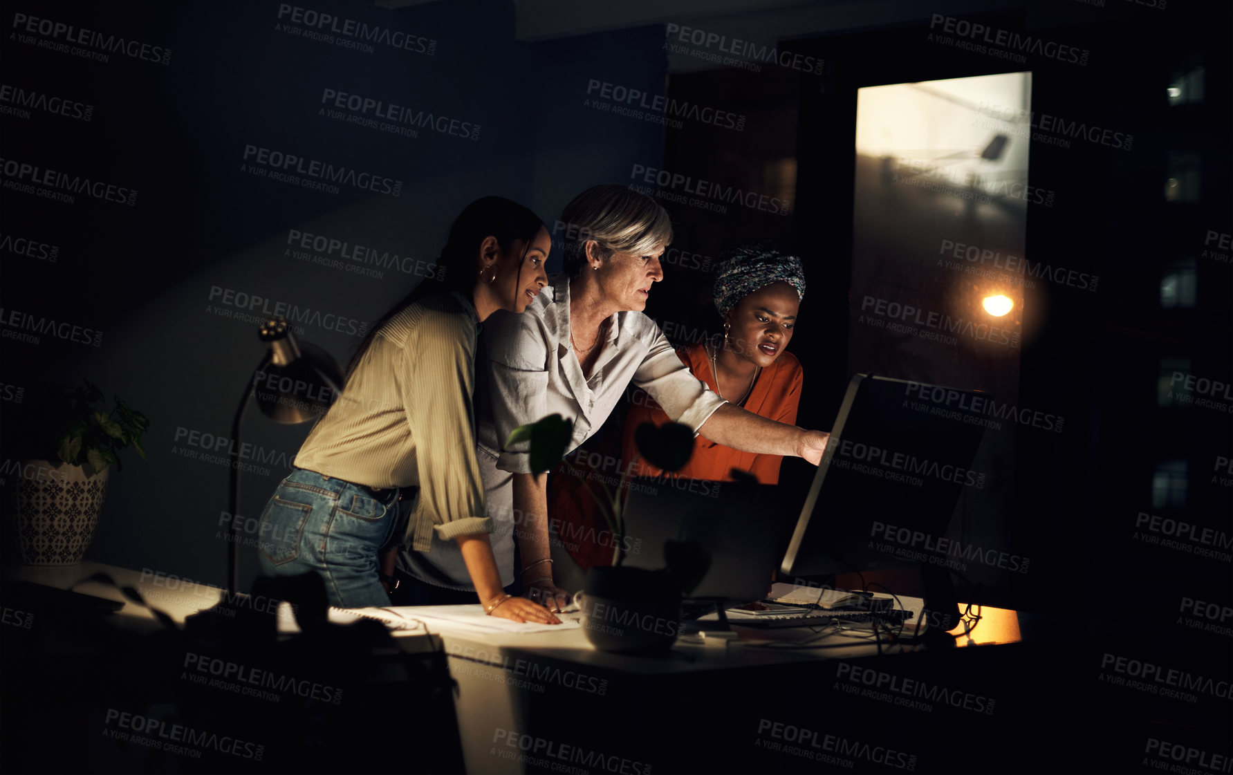 Buy stock photo Digital agency, technology and research at night in office for company project, diversity and late deadline. Business team, working and strategy in workplace as women with burnout for collaboration