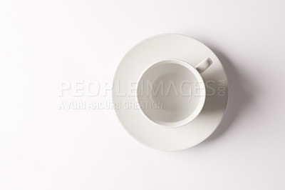 Buy stock photo Closeup shot of a cup and saucer against a white background