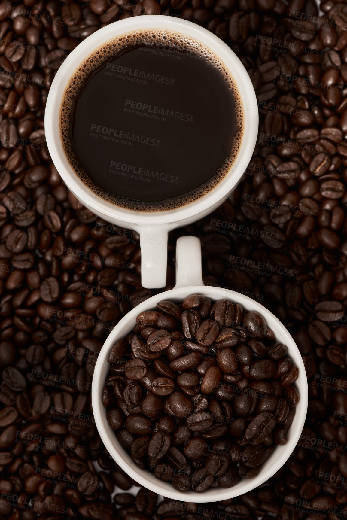Buy stock photo Closeup shot of two cups of coffee surrounded by coffee beans