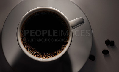 Buy stock photo Studio, above and beans with coffee cup for cafe, bistro and breakfast for customer service by closeup. Hospitality industry, mug and beverage with caffeine by dark background, mocha and filter latte