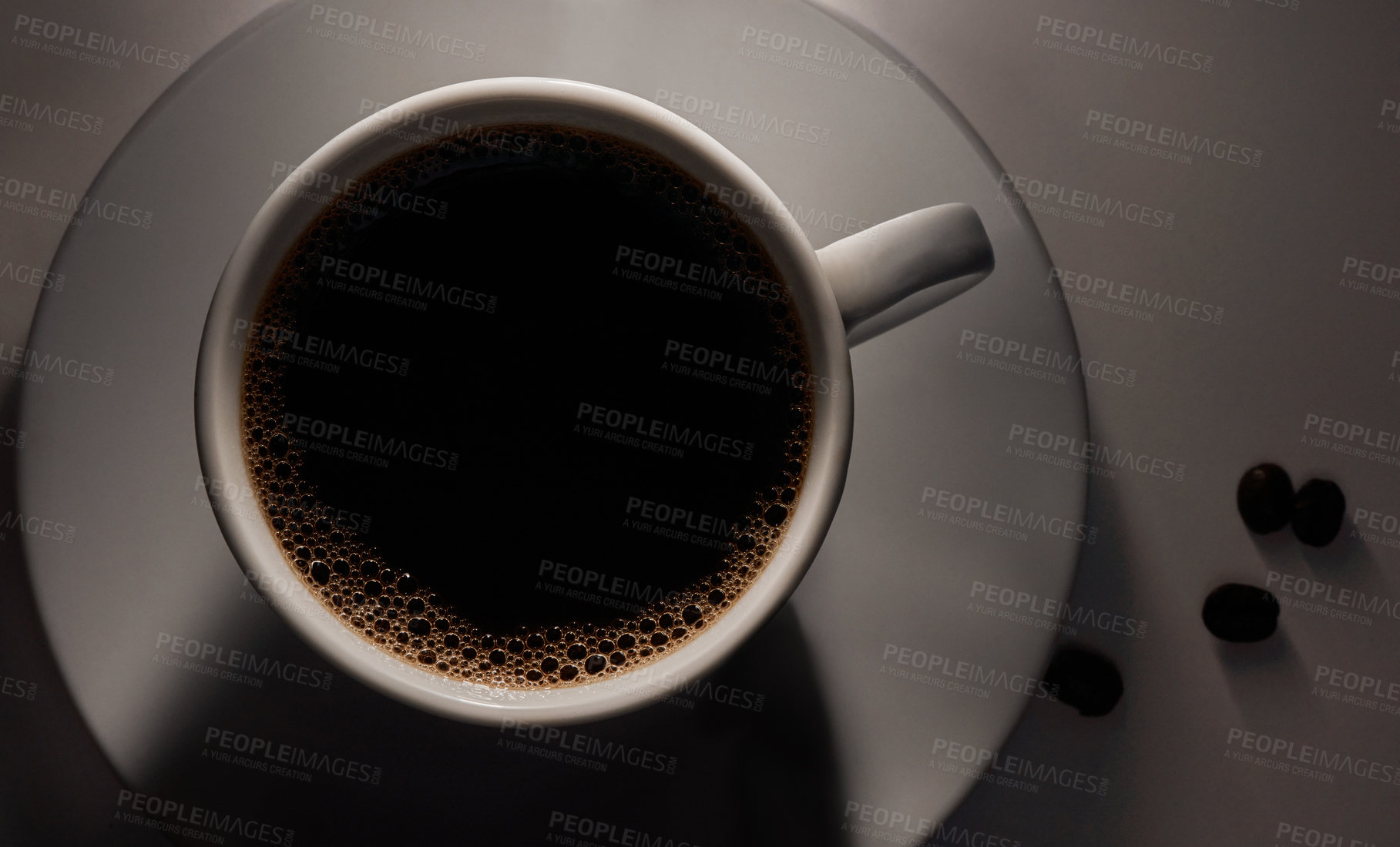 Buy stock photo Studio, above and beans with coffee cup for cafe, bistro and breakfast for customer service by closeup. Hospitality industry, mug and beverage with caffeine by dark background, mocha and filter latte