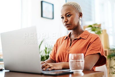 Buy stock photo Typing, online and black woman with laptop, office and thinking of ideas and copywriting. Writer, working and creative for website on desk, seriously and confident in company and reading of person